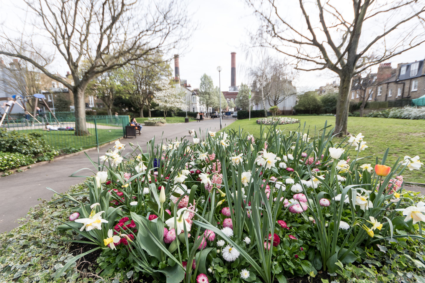 Lots-Road-Power-Station-behind-spring-flowers-in-Westfield-Park